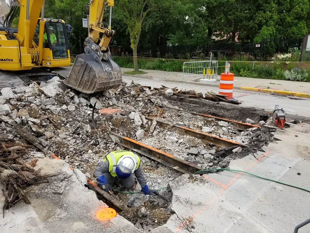 Digging up the buried Milwaukee Streetcar rails
